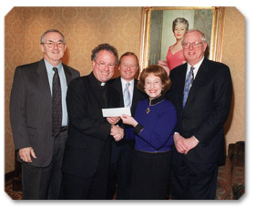 Trustees of the Virginia G. Piper Charitable Trust with Father Eddie Reese